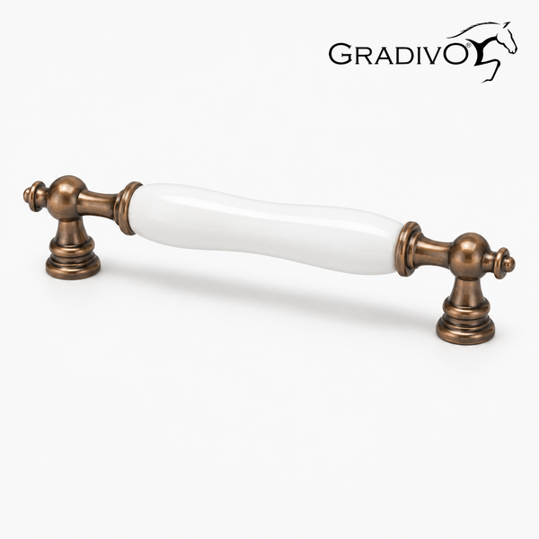 Möbelgriff GRADIVO aus antik-messingfarbenem Metall und weißem Porzellan im Landhausstil. GRADIVO Logo.
