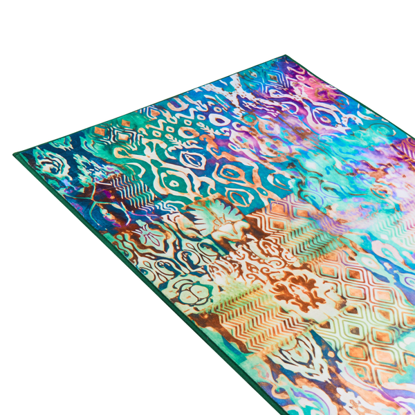 Gemustertes Textil mit abstrakten Ornamenten in Blau, Türkis und Violett