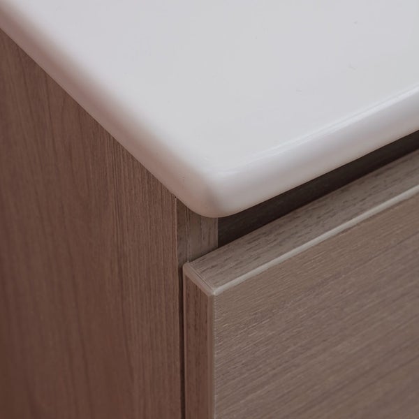 Detailaufnahme eines Waschtischunterschranks mit Schublade und Waschbecken
