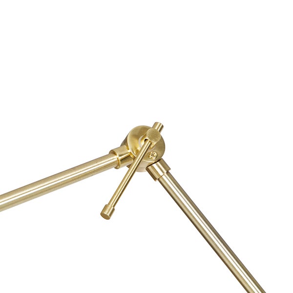 Detailaufnahme eines goldenen Lampengelenks mit Drehmechanismus.