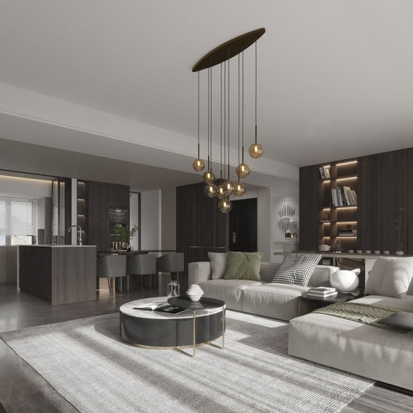 Wohnzimmer mit Sofa, Couchtisch und Beleuchtung