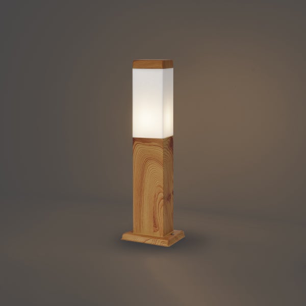 Quadratische Sockelleuchte aus Holz mit weißem Lichtdiffusor.