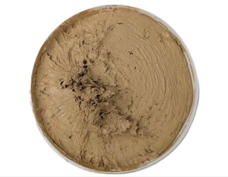 Spachtelmasse in runder Verpackung von oben