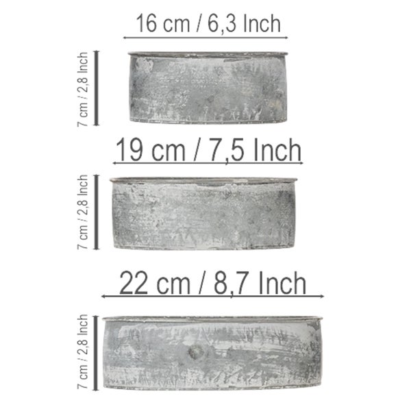 Drei runde Zinkschalen in verschiedenen Größen: Durchmesser 16 Zentimeter, 19 Zentimeter und 22 Zentimeter, Höhe jeweils 7 Zentimeter.
