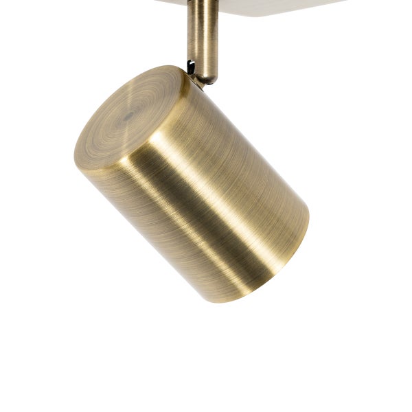 Zylindrischer Strahler in Altmessing-Optik mit verstellbarem Gelenk.