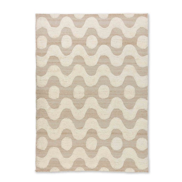 Teppich mit Wellenmuster und Kreisen in Beige und Creme.