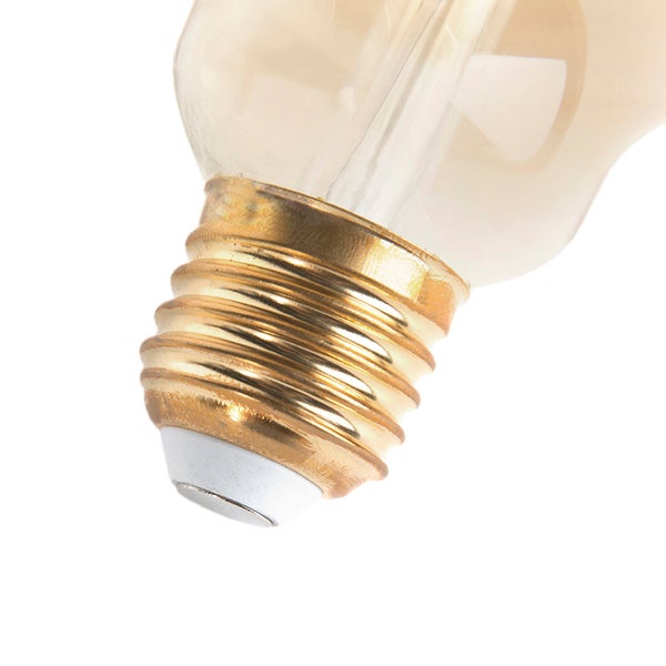 Nahaufnahme eines E27 Metall-Schraubsockels einer Vintage LED-Lampe.