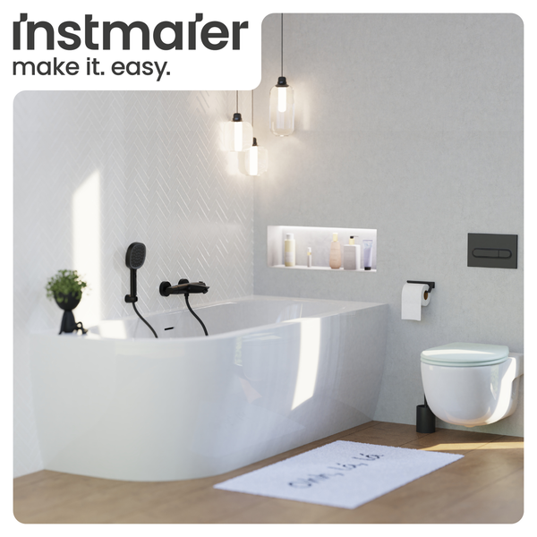 Badezimmer mit Badewanne, Toilette und Waschtisch von Instmaier