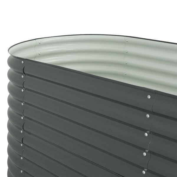 Hochbeet aus gewelltem Metall mit abgerundeter Ecke und sichtbaren Verschraubungen.