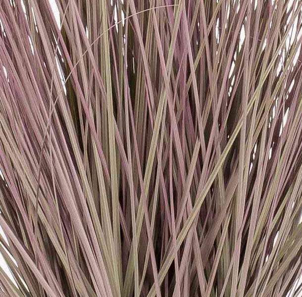 Kunstpflanze in einem runden Metalltopf mit rustikaler Oberfläche und horizontalen Zierrillen.