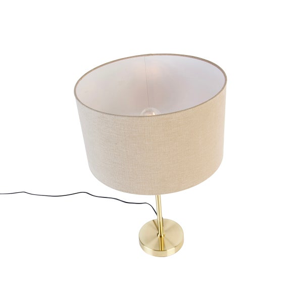 Tischleuchte mit Leinenschirm und metallener Basis