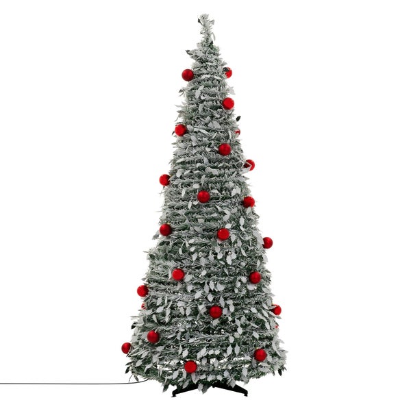Künstlicher, beschneiter Weihnachtsbaum mit rotem Christbaumschmuck und integrierter Beleuchtung auf einem Ständer.