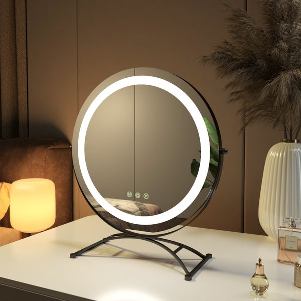 Runder Schminkspiegel mit LED-Beleuchtung auf einem Tisch