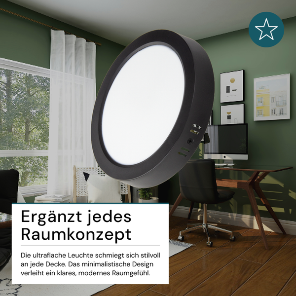 Schlafzimmer mit runder Deckenleuchte, Schreibtisch, Computer und Bürostuhl