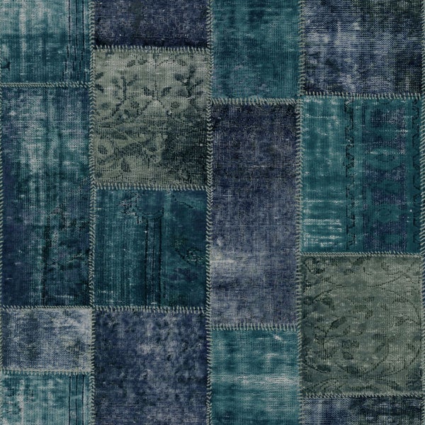 Teppich im Patchwork-Design mit verschiedenen Mustern