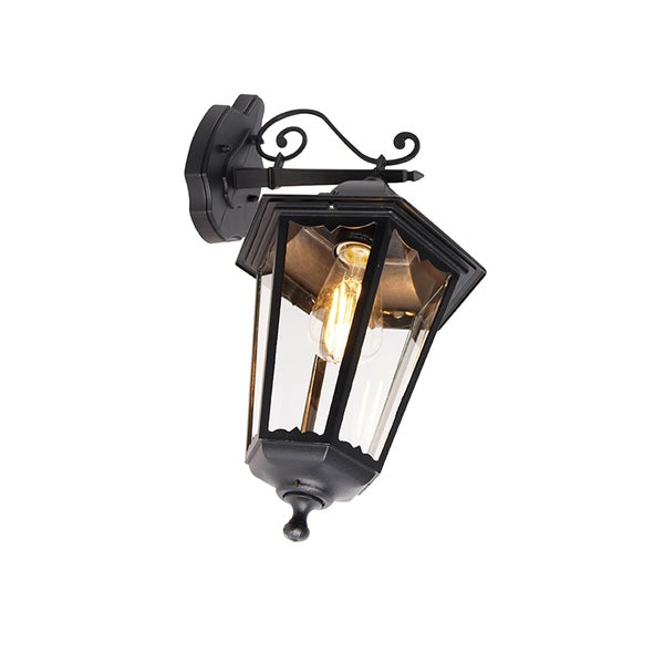 Außenwandleuchte im klassischen Laternendesign aus schwarzem Metall und klarem Glas mit dekorativem Wandarm.