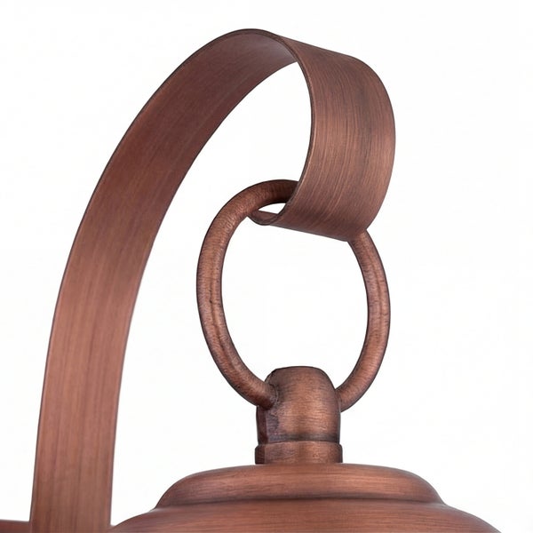 Detail einer Deckenleuchte mit geschwungenem Arm und ringförmiger Aufhängung