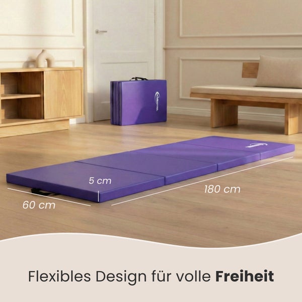 Lila Klappmatratze mit den Maßen 180 cm mal 60 cm mal 5 cm auf dem Boden.