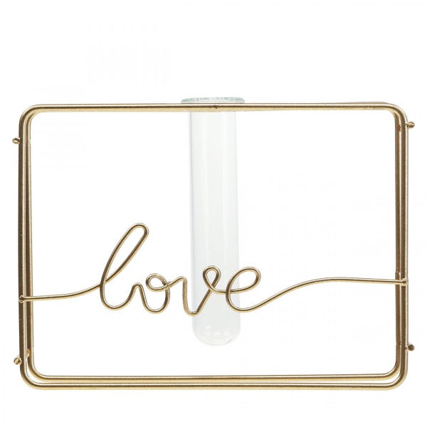 Dekorative Blumenvase mit der Aufschrift Liebe und einem Reagenzglas