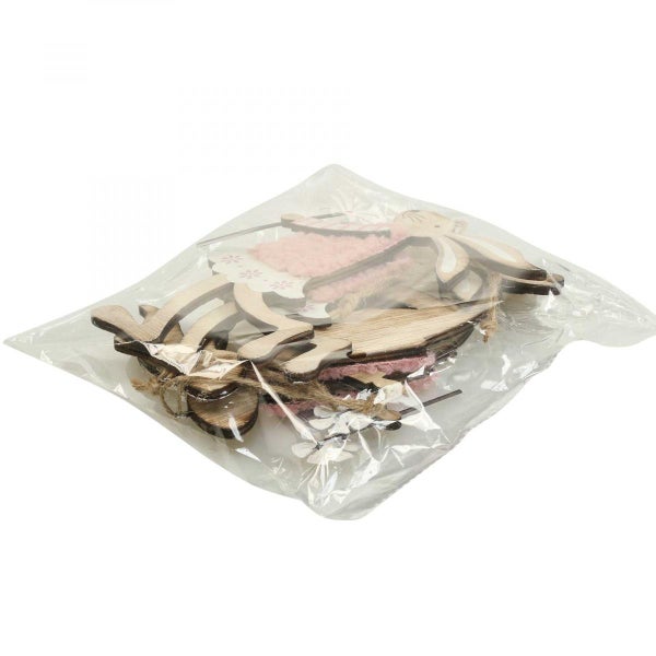 Dekorative Osterfiguren aus Holz im Beutel