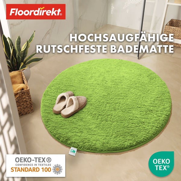 Hochflor Badematte in Grün mit Hausschuhen im Badezimmer und Floor direkt Logo