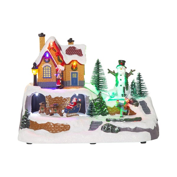 Weihnachtliche Miniaturlandschaft mit Haus, Schneemann, Schlittenfahrt und Beleuchtung