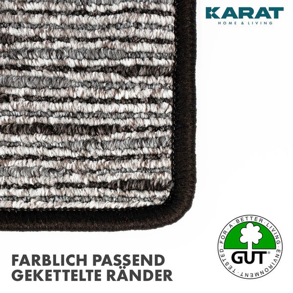 Nahaufnahme eines gestreiften Teppichs mit farblich passendem geketteltem Rand. Karat Home und Living Logo. Siegel für umweltfreundliche Teppiche.