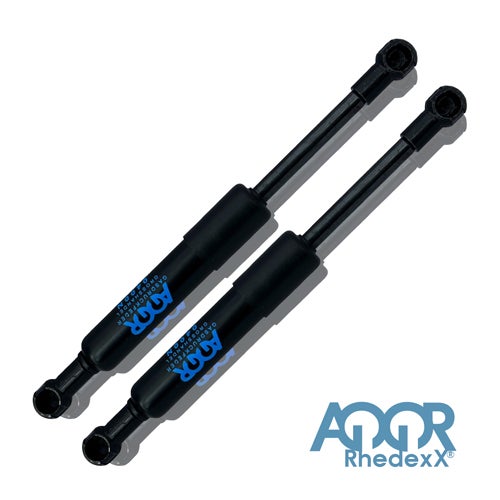 Zwei schwarze Gasdruckfedern von AGQR Rhedexx für Möbel. AGQR Rhedexx Logo.
