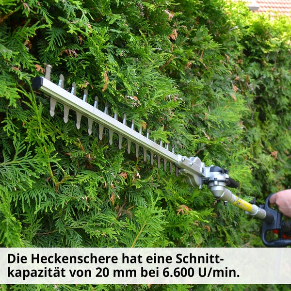 Heckenschere im Einsatz zum Schneiden einer Hecke.