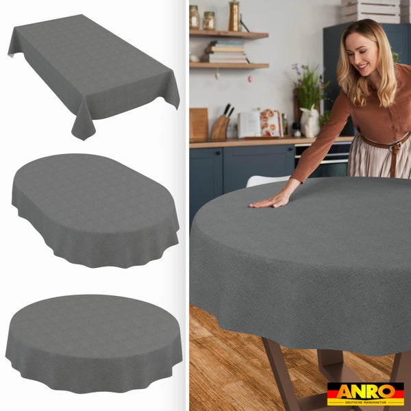 Graue Tischdecke in rechteckiger, ovaler und runder Form auf einem Holztisch in einer Küche, Anro Logo.