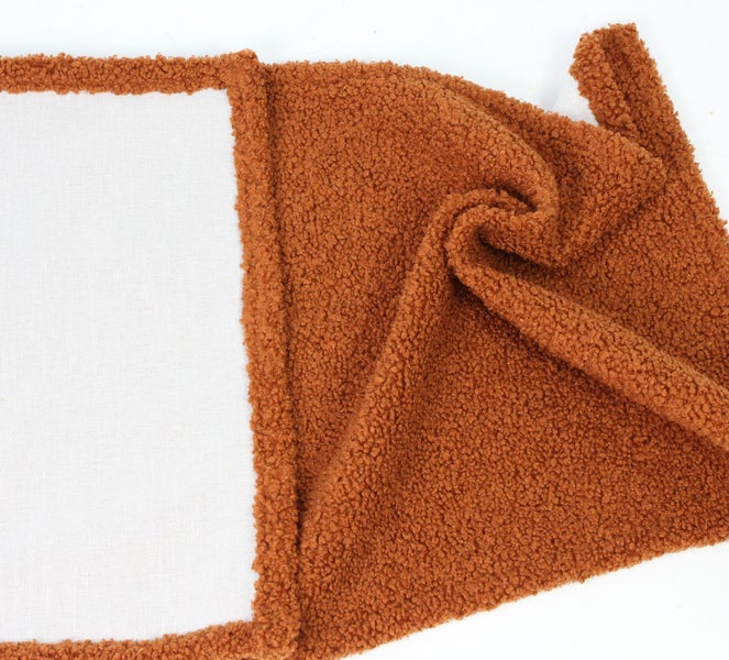 Stoffmuster mit Teddyplüsch auf weißem Stoff