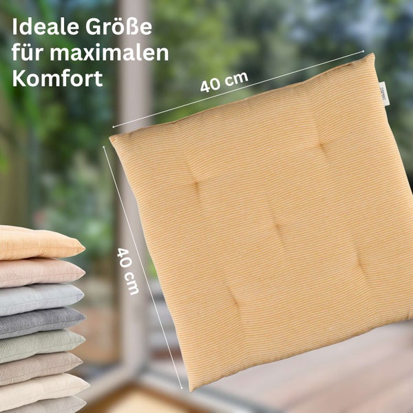 Quadratisches Sitzkissen mit Streifenmuster und Maßen von 40 mal 40 Zentimeter sowie Esprit Logo.