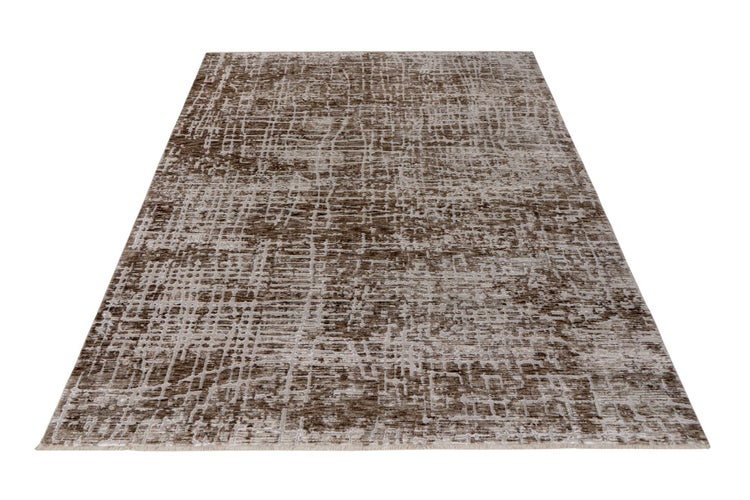 Rechteckiger Teppich mit abstraktem, texturiertem Muster in Vintage Optik.