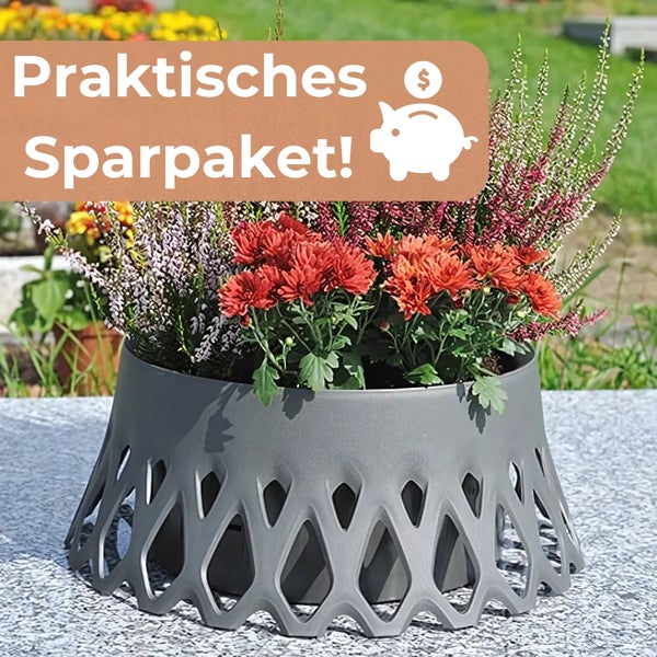 Blumenarrangement in einem dekorativen Pflanzgefäß mit Aussparungen