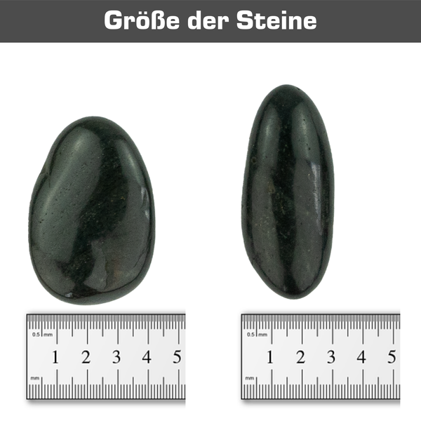Polierte schwarze Kieselsteine zur dekorativen Gestaltung im Innen- und Außenbereich.
