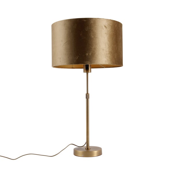 Tischleuchte mit rundem goldfarbenem Stoffschirm und Metallgestell.