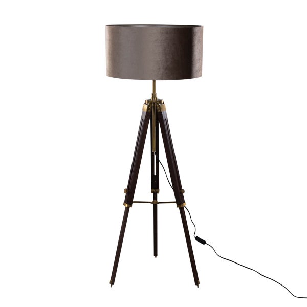Stehlampe mit grauem Samtschirm in Trommelform und einem Dreibeingestell aus dunklem Holz mit messingfarbenen Metalldetails.