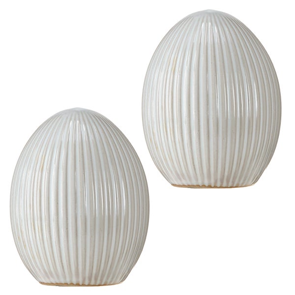 Zwei dekorative Keramikobjekte in Eiform mit gerippter Oberfläche