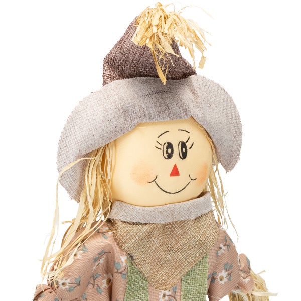 Dekorative Strohpuppe für Herbstdekorationen
