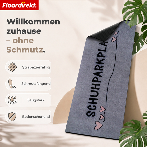 Floordirekt Logo über Schmutzfangmatte mit Aufschrift Schuhparkplatz und Herzmotiven, Merkmale sind strapazierfähig, schmutzfangend und saugstark.
