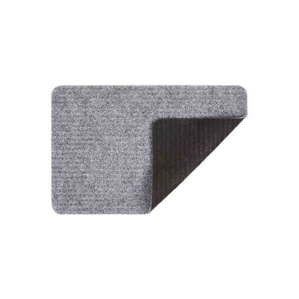 Graue Fußmatte mit abgerundeten Ecken und rutschfester Unterseite