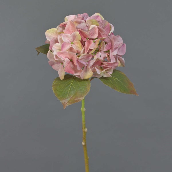 Künstliche Hortensie mit rosa Blüten und grünem Stiel.