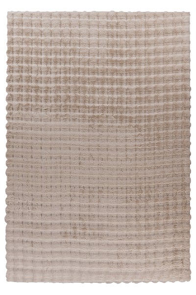 Rechteckiger Teppich mit weicher Waffelstruktur aus Kunstfell in Beige.