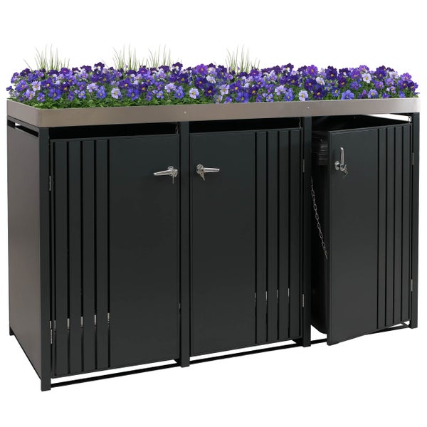 Mülltonnenbox mit Pflanzschale, abschließbaren Türen und Blumen bepflanzt