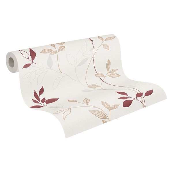 Dekoratives Zimmer mit Kommode, Zimmerpflanze und Plattenspieler vor einer gemusterten Tapete