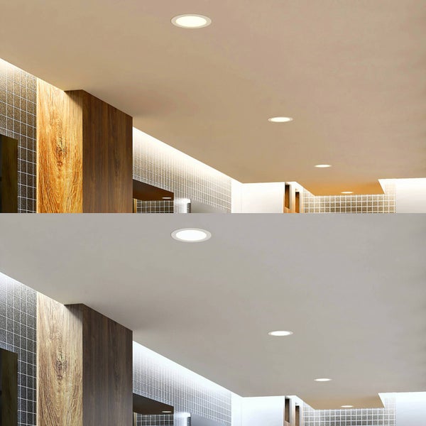 LED-Einbaustrahler im Vergleich zwischen warmweißem und kaltweißem Licht in einem hellen Raum mit Holz- und Fliesenelementen.