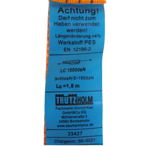 Informationsetikett eines Spanngurtes mit technischen Daten und Sicherheitshinweisen für die Ladungssicherung von Trutzholm