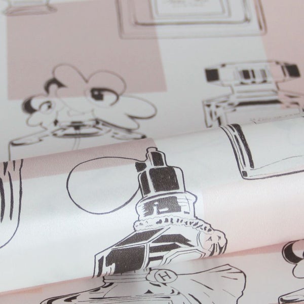 Tapetenrolle mit Parfümflakon-Muster