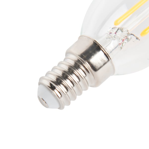 Detailansicht eines LED-Leuchtmittels mit E14-Schraubsockel aus Metall und klarem Glaskolben.