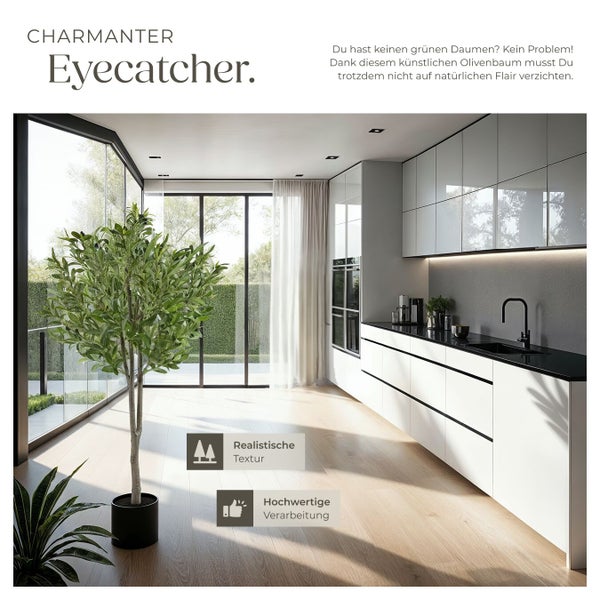 Künstlicher Olivenbaum im Topf in einer modern eingerichteten Küche